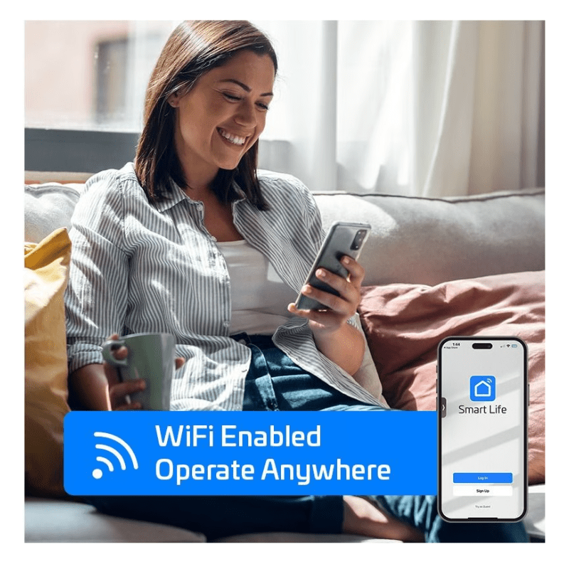 WiFi enabled mini split from ACiQ being controlled by woman using smartphone app from couch