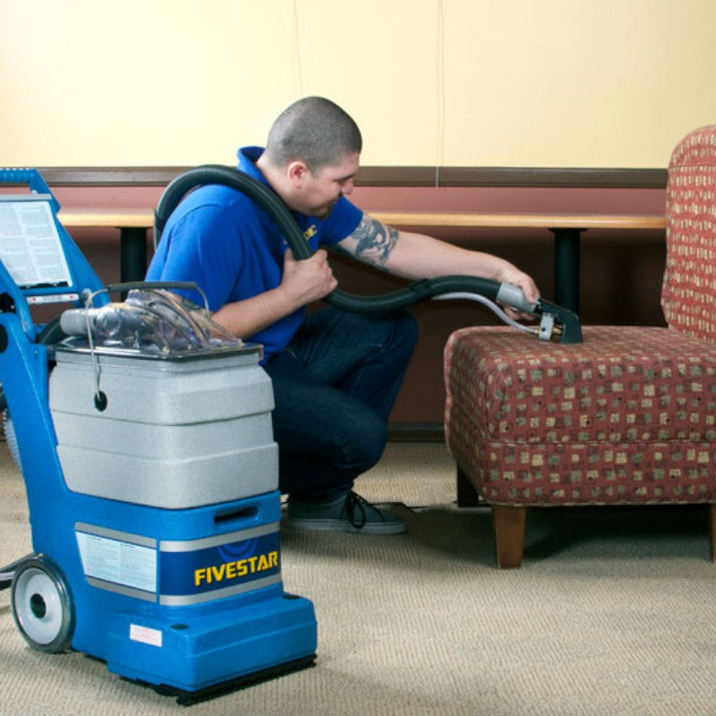 man using EDIC Fivestar on upholstery